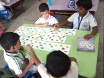 UKG children arranging pictures
